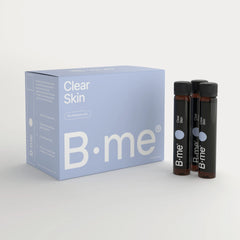 B.me Clear Skin box with three daily shots, photographed on a light background.