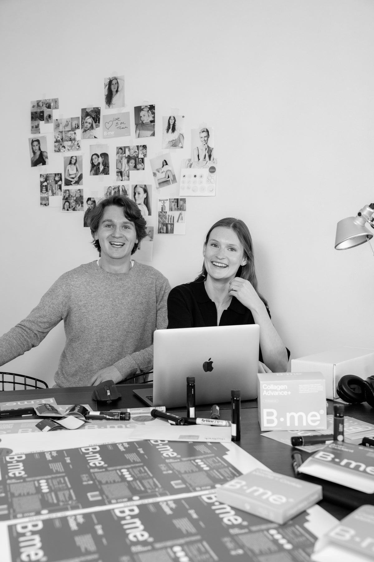 B.me co-founders Maxime Vanhulle and Camille Wille smiling in office setting