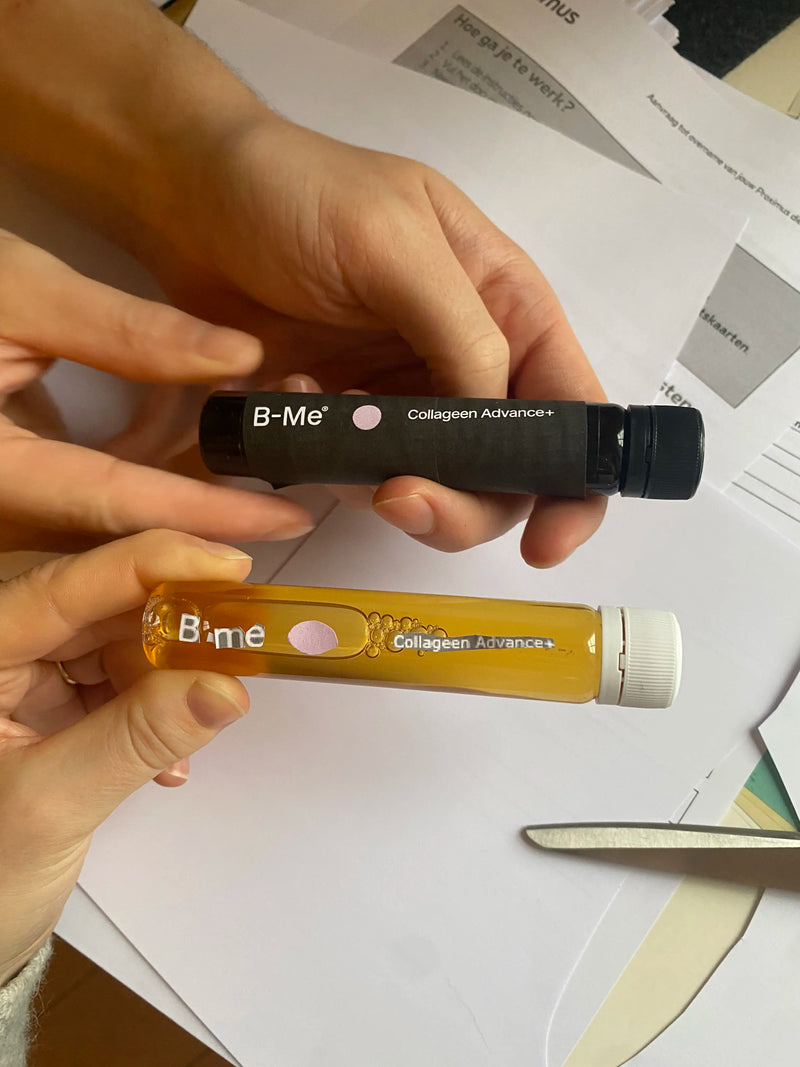 Behind the scenes at B.me: testing Collagen Advance+ shot label designs with Studio Sissi. A hands-on creative moment comparing transparent and black packaging options during development.
