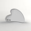 B.me roestvrij stalen gua sha massagetool in hartvorm, zilverkleurig, met B·me logo