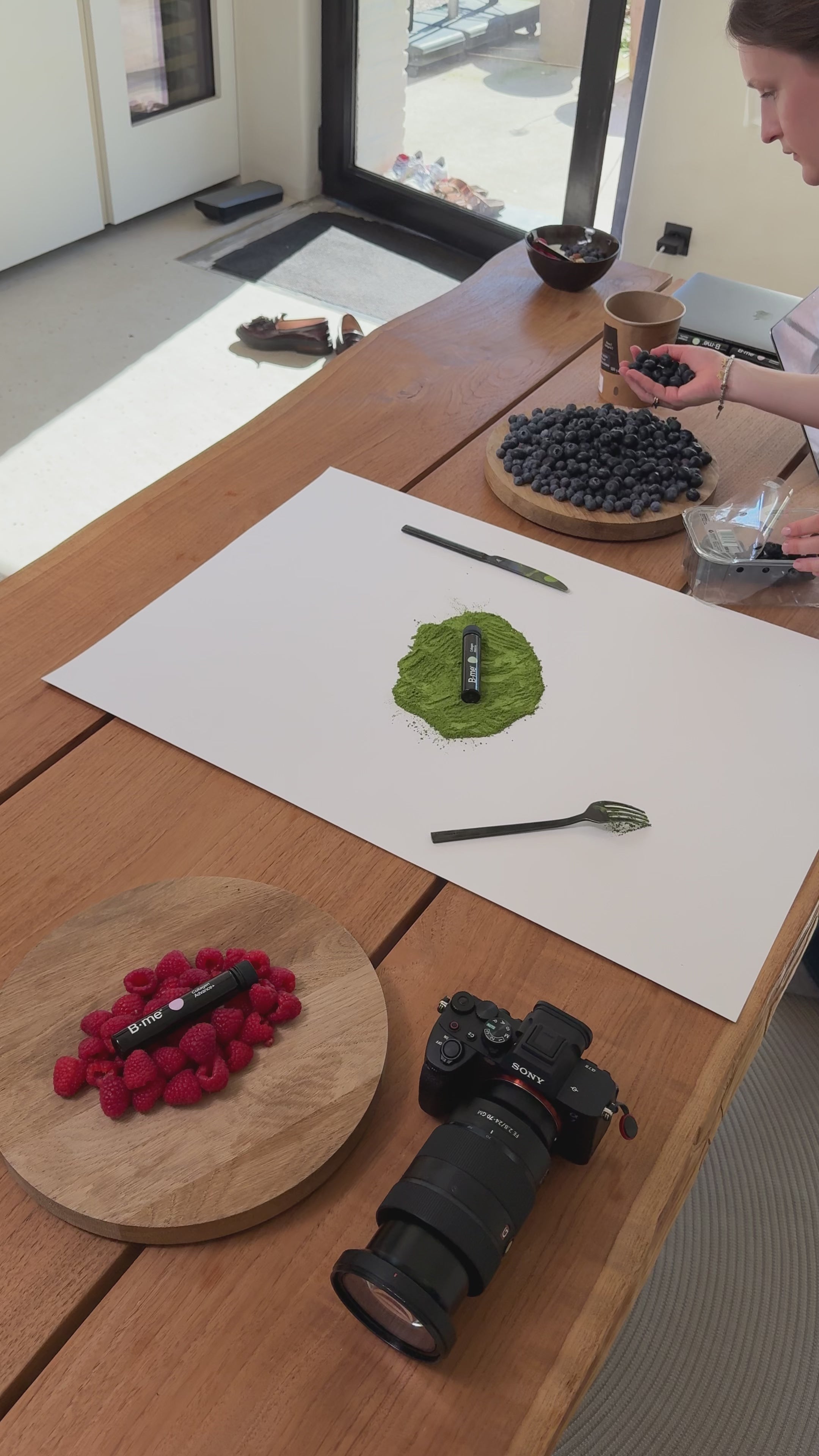 Behind the scenes of B.me ingredient shoot with collagen and antioxidant shots